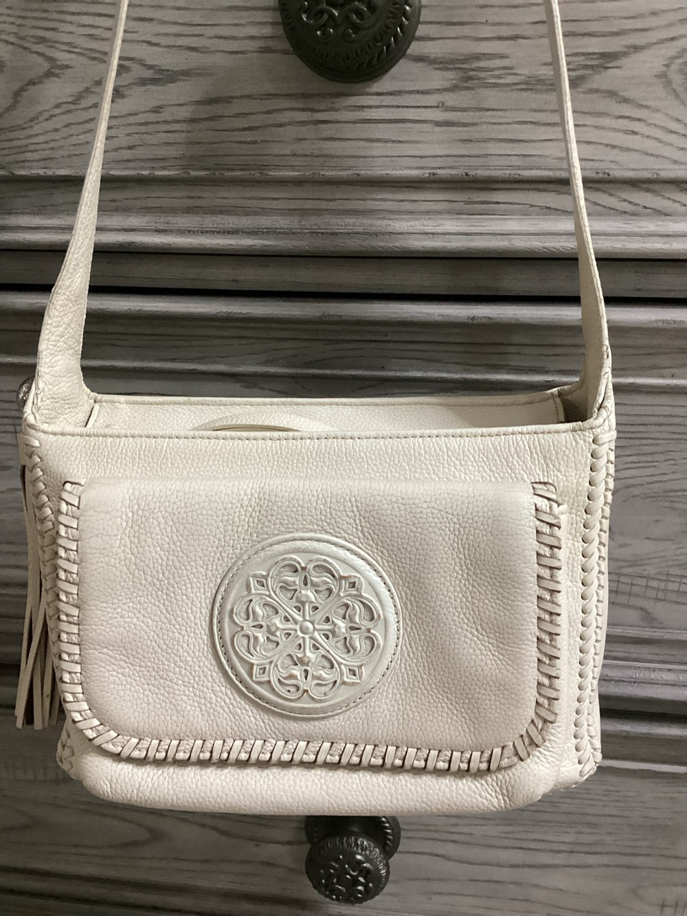 Brighton Ferrara Medallion Cream Pebbled Leather Crossbody Bag